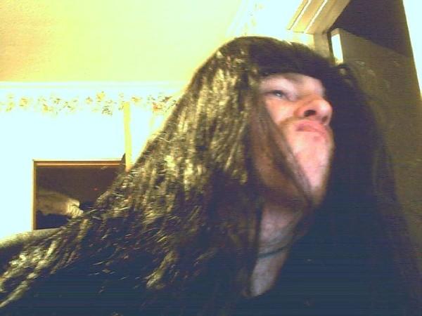 this is actually a picture of myself in a wig. at least i can admit im a loser. :D