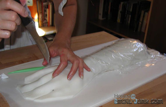 how to make a cake in the shape of a ripped of arm
