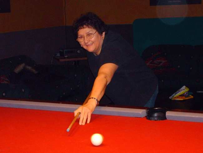 shes not even looking at the white ball.