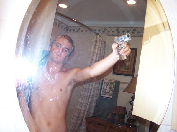 He takes a myspace picutre trying to act cool and hard and ganster and doesnt even have a real gun instead he has an airsoft gun. wow.gay.