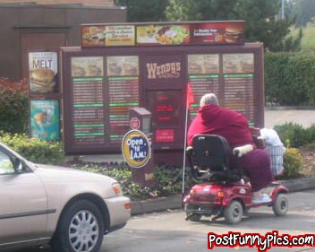 funny picture of electric scooter being driven by old person and ordering at the drive thru at Wendy's