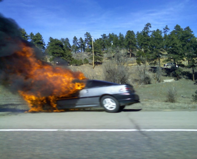 Alright, so laughing at this is somewhat twisted... but... it certainly is interesting.  I took this shot on I-70 while returning from Denver.  I guess someone forgot to check their coolant and their car overheated.