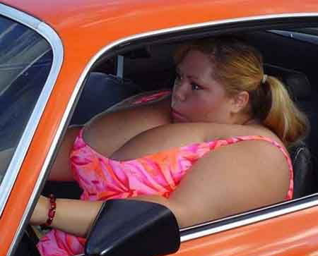 This lady has hooters ! She has no need for an airbag.