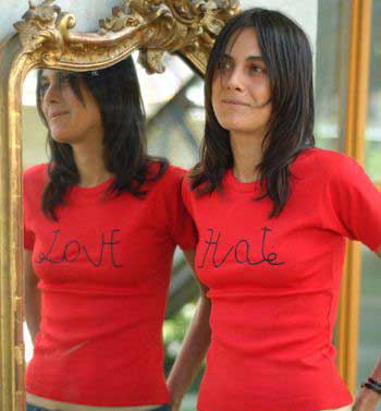 This is a cool teeshirt idea. If you look at it through a mirror it says something different.