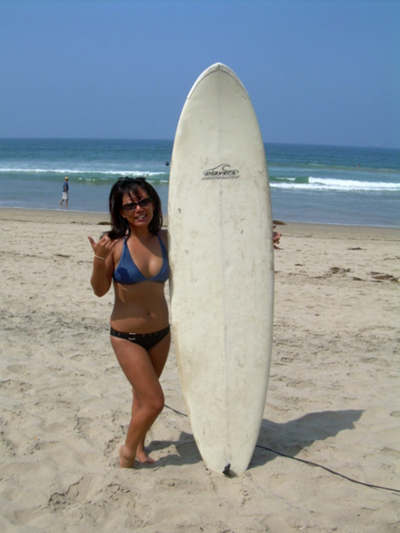 Surf girl on beach in Florida
