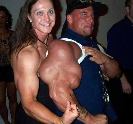 i didnt realize at first, but if she wasnt next to that gross-armed dude, her bicep would look disgustingly big