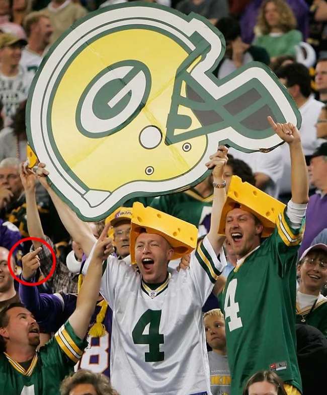 Vikings fan flips off Cheeseheads in picture.