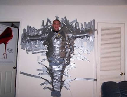 Guy got drunk and his friends duct taped him to the wall
