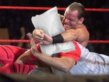 Chris performing his famous sleeper hold.