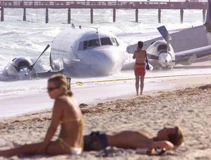 Just a normal day at the beach.....with a plane.