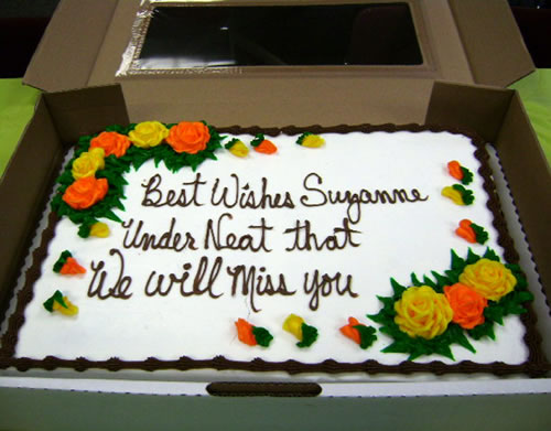 The person ordering told them to write Best Wishes, Suzanne and underneath that write We will miss you. This is the cake that was delivered.