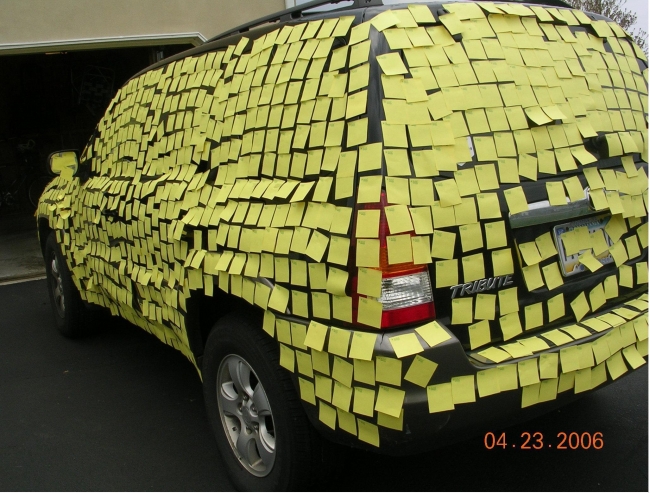 car covered in sticky notes