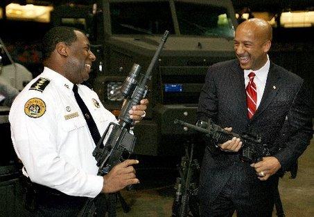 New Orleans mayor Ray Nagin the chocolate city guy is back to doing more intelligent things. This time he is showing off the new M4 rifles the police force bought by pointing it at the police chief and laughing.