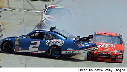 Kurt Busch, driver of the No. 2 Miller Lite Dodge, crashes into Tony Stewart, driver of the No. 20 Home Depot Chevrolet, during the Autism Speaks 400 on June 4, 2007.