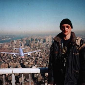 The photograph show a tourist having his picture taken atop one of the World Trade Centre towers moments before a plane was crashed into it on September 11th 2001. The  picture was recovered from a camera found in the rubble of the tower.