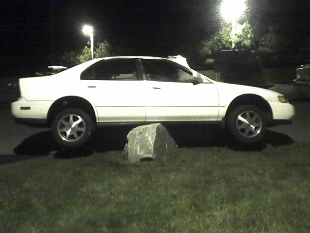 car stuck on rock