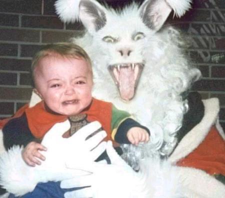 A disturbing bunny in what appears to be a santa suit.