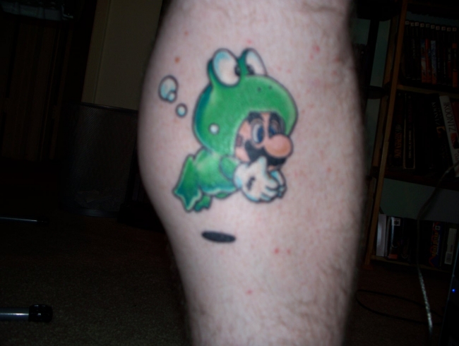 I know I am a little late on the video game tattoo's but here are my contribution.