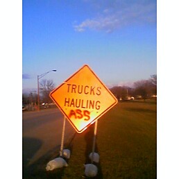 Trucks Hauling sign had a little something added to it.