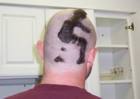 this guy got his hair shaved in the shape of a guy pooping