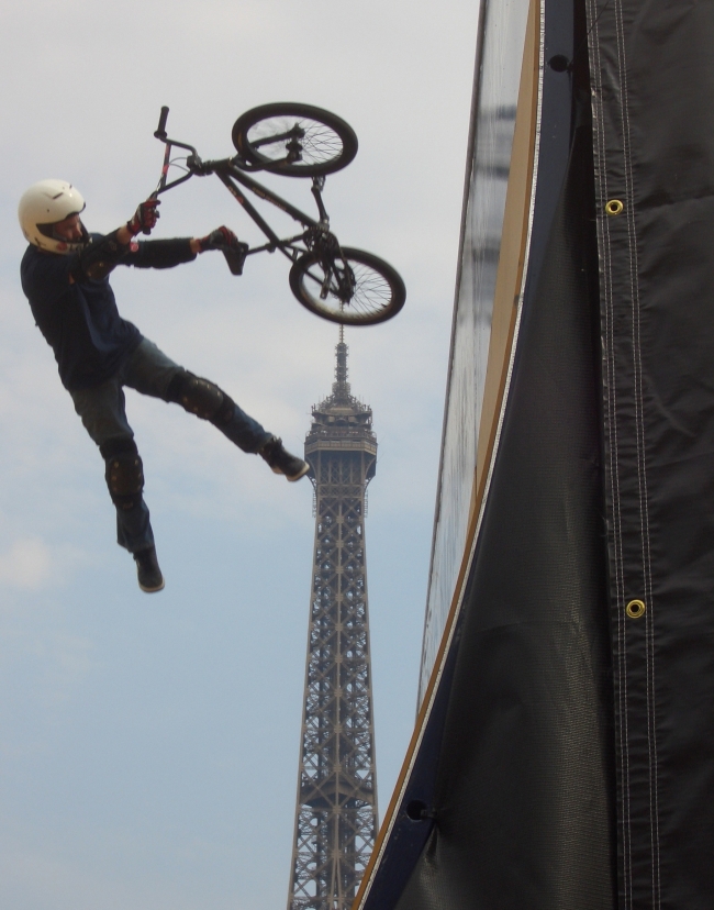 A tailwhip lines up perfectly with the Eiffel tower