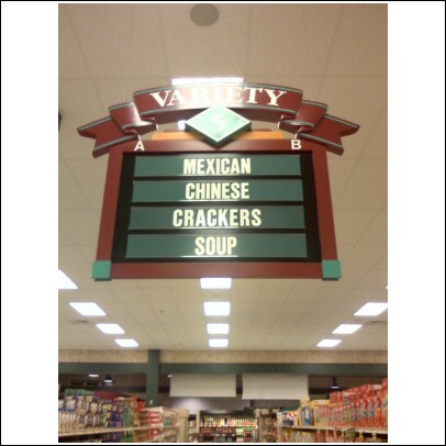 This is a sign hanging above a food aisle in a local grocery chain