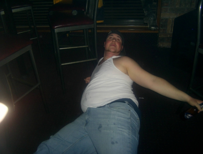 my BIG buddy laying on the ground, wasted lookin like a pregnant beached whale!!! Hahaha