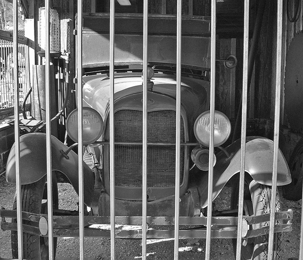 Old Mining Truck safe behind bars.