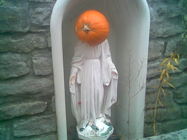 Pumpkin on marys head.