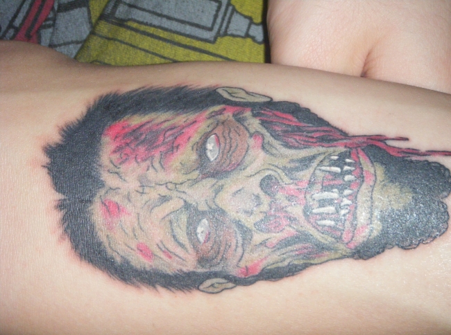 i recently got a tattoo that looks like me as a zombie i have enclosed the pic of the tat and the pic of me for comparison