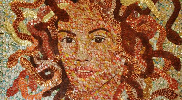 women's face made of bottle caps