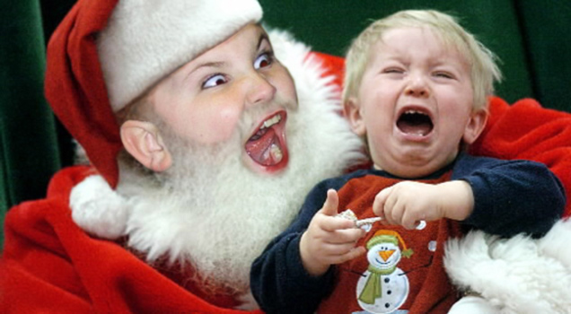 child faced santa and another crying child