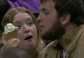 Basketball fan refuses to share ice cream with girlfriend, becomes instant internet celebrity. Chris Webber narrates the play-by-play.