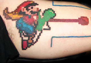 Retro styled tattoos, including some very familiar characters.