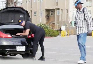 A dude wears yoga pants to prank some guys as they walk by checking him out.