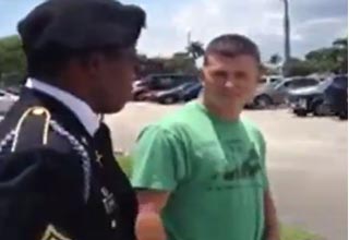 At a funeral over the weekend in West Palm Beach, this man is casually approached by a couple of suspicious Marines.