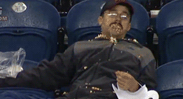 drunk football fan popcorn gif