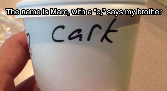 cup with the word cark handwritten on it