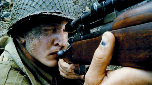 soldier aiming a shotgun