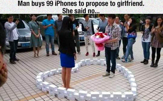 guy proposing to girlfriend with 99 iphones in the shape of a heart