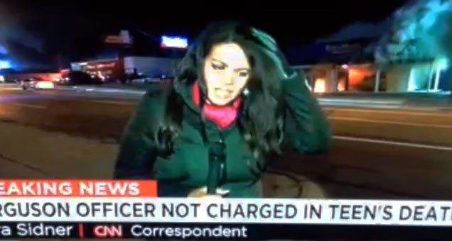 cnn reporter hit in the head by rock