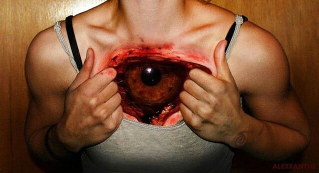 3D eyeball tattoo on girl's chest