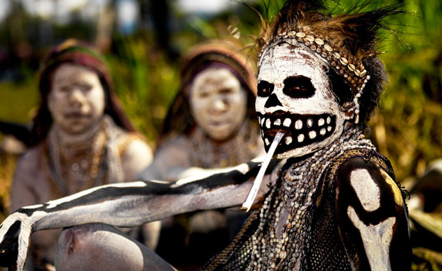 tribal man with skeleton makeup