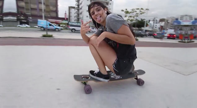 girl dancing while longboarding