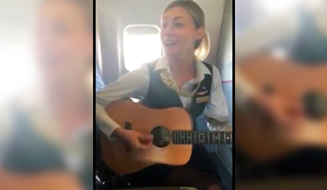 Flight Attendant Sings To Passengers