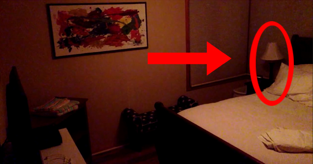 a room at night. there's a circle around the lamp and an arrow pointing at the circle.