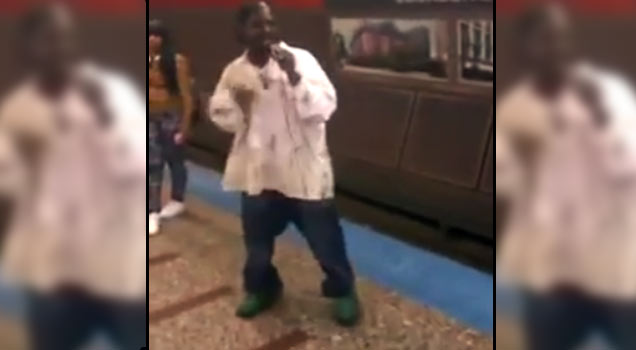 homeless man in subway rapping