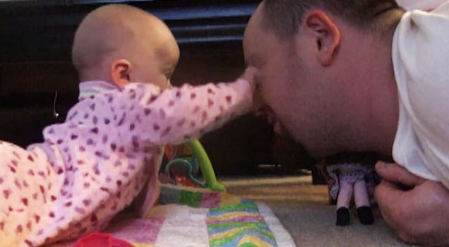 baby punches dad in the face