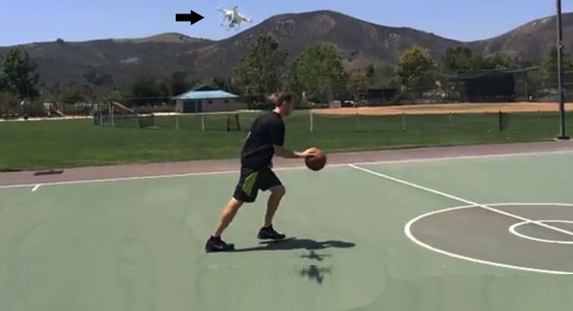 quad-copter filming basketball player