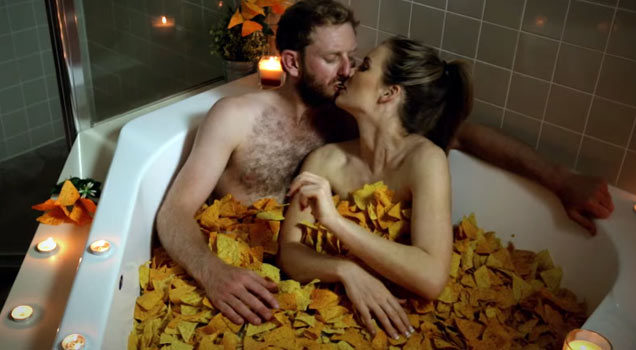 couple taking a bath in doritos